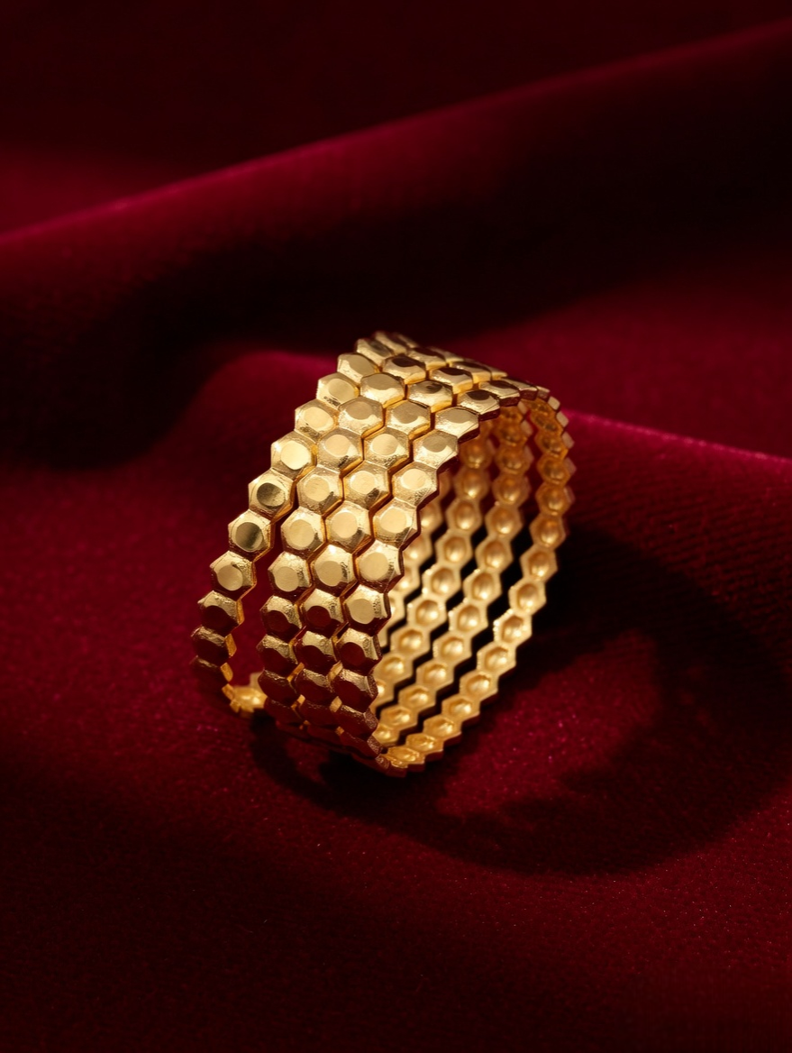 Sophisticated Gold Bangles with Subtle Sparkle