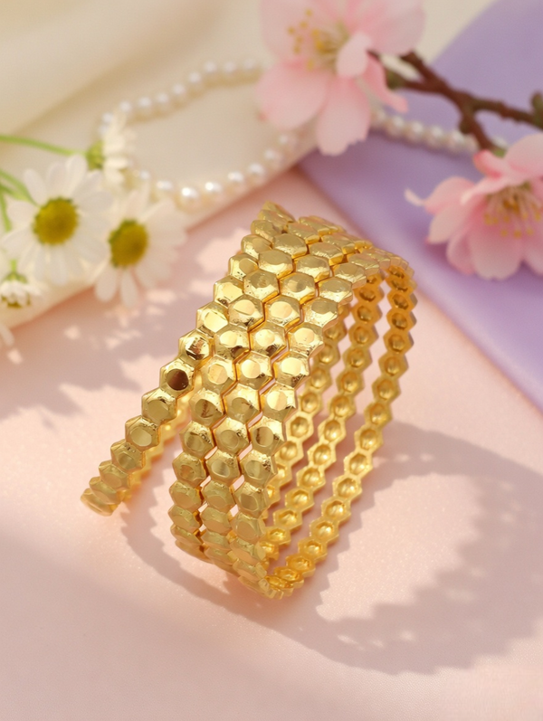 Sophisticated Gold Bangles with Subtle Sparkle